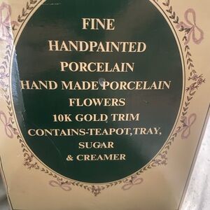 Cracker Barrel Gold and Cream Porcelain Plaque